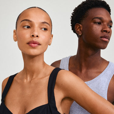 Aretes de botón, forma estrella de mar, baño de oro 18k — ANDRE